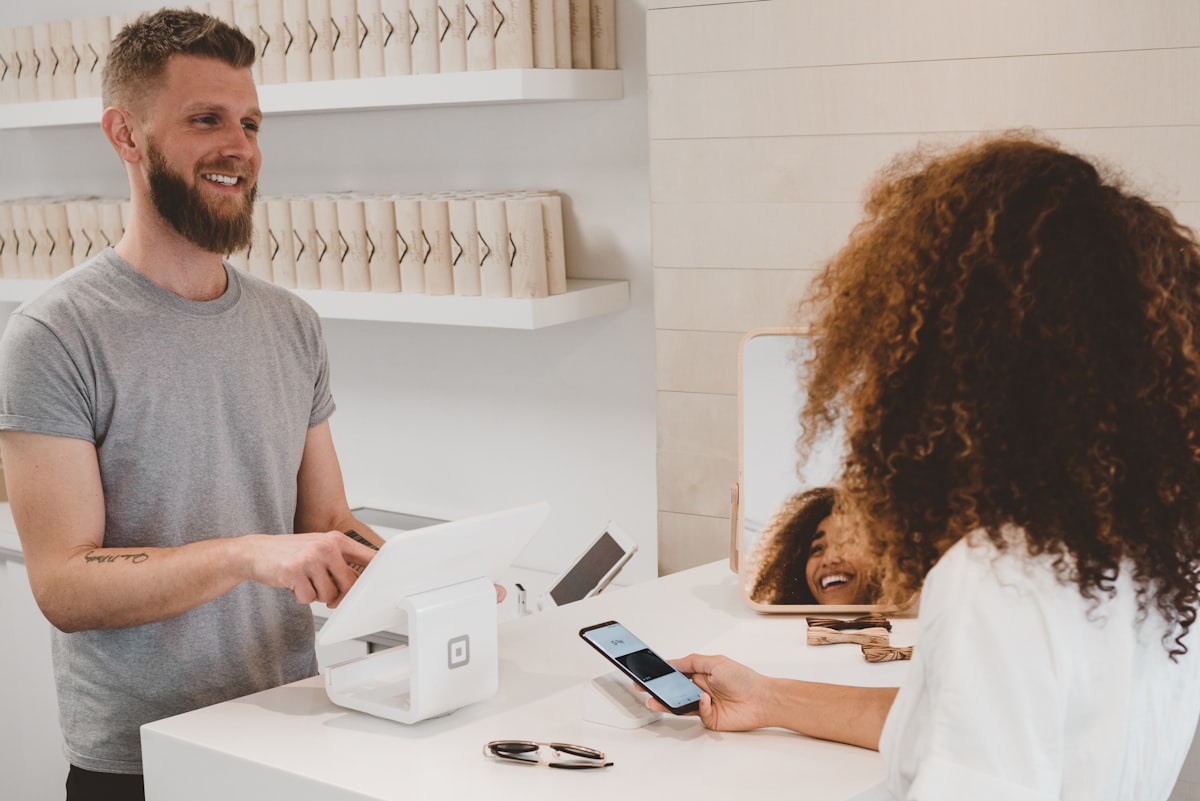 Person using a contactless fintech payment card